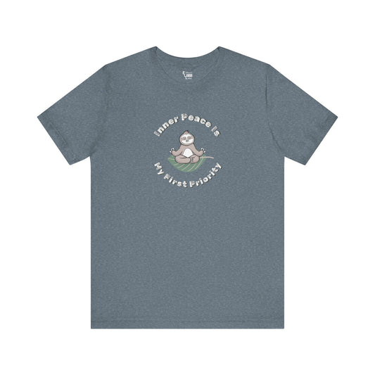 Blue t-shirt with a meditating sloth graphic and text 'Inner peace is my first priority' on a white background