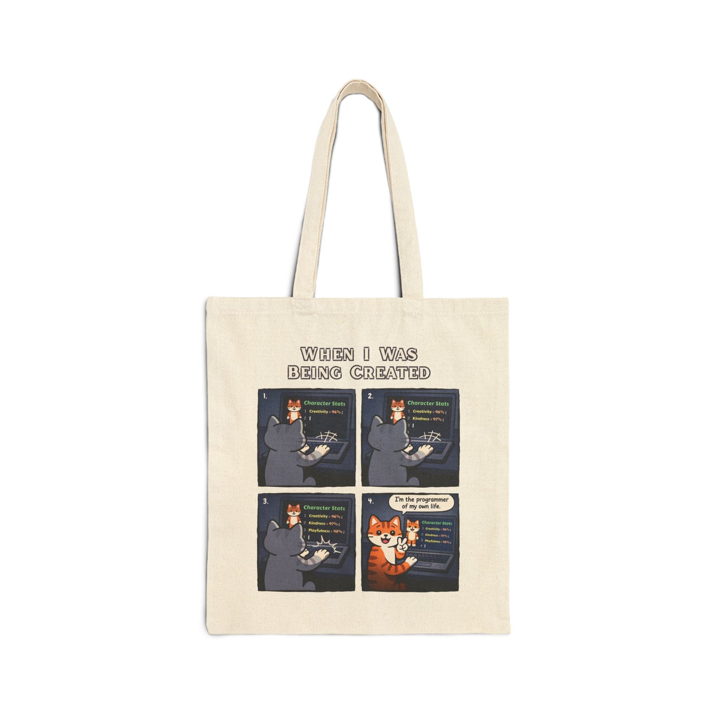 Tote bag with a 4-panel comic of a cartoon cat and title "When I Was Being Created" on a white background