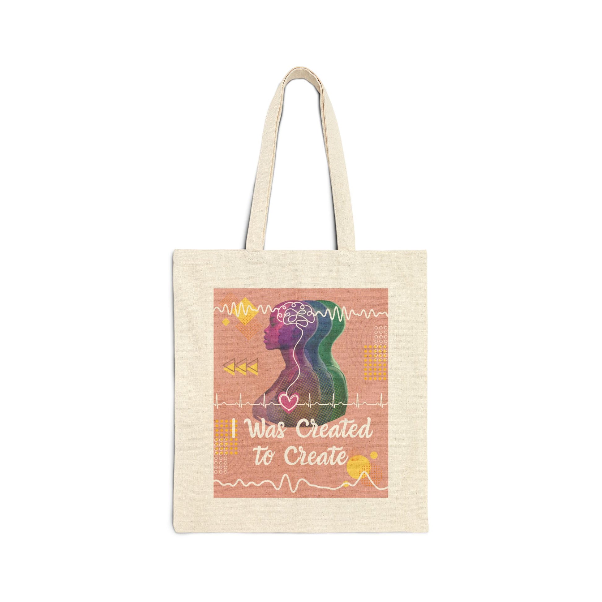 Tote bag with brain waves and heart rhythm and other colorful doodles and text "I Was Created to Create" on a white background