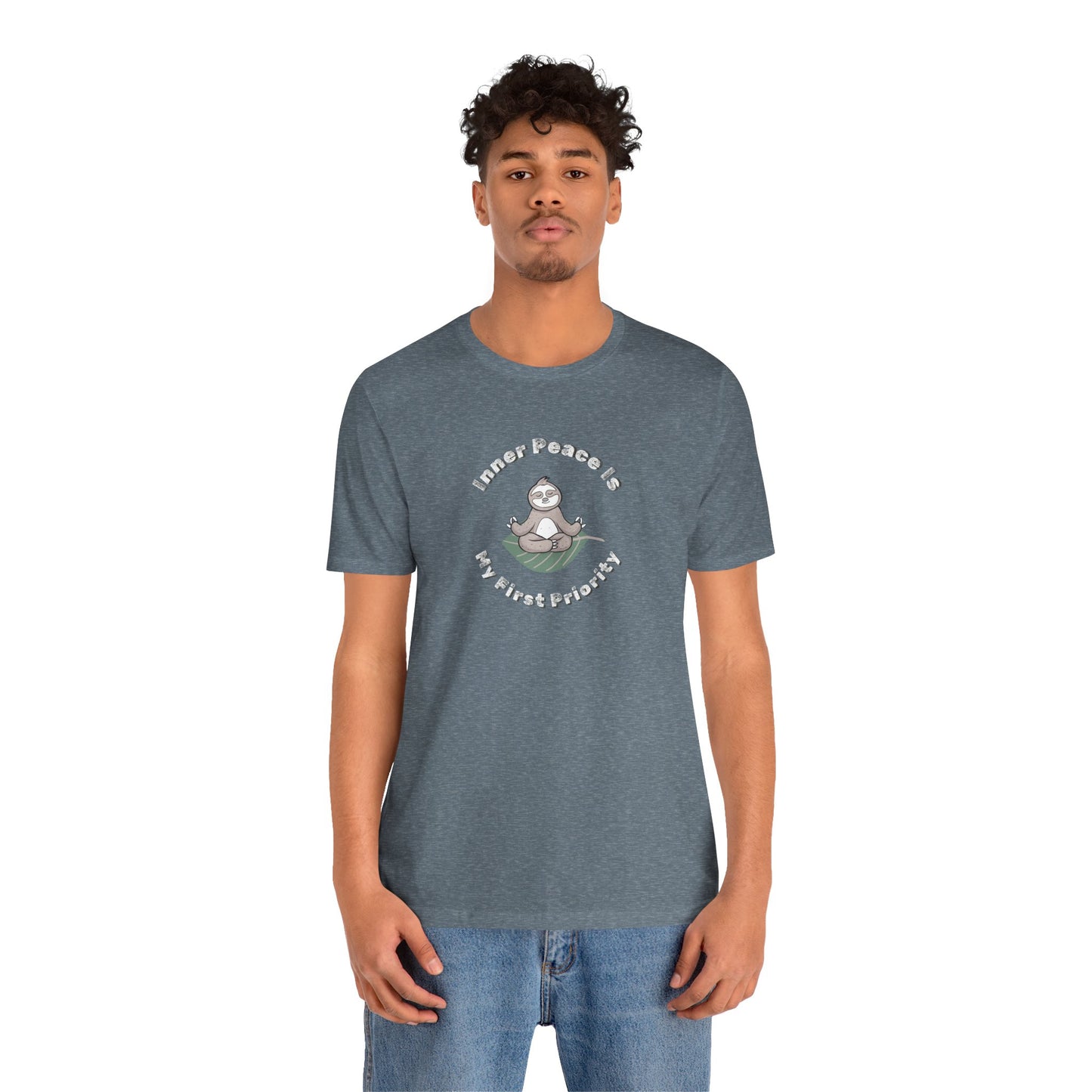 Man wearing a blue t-shirt with a graphic of meditating sloth and text 'Inner peace is my first priority' on a white background