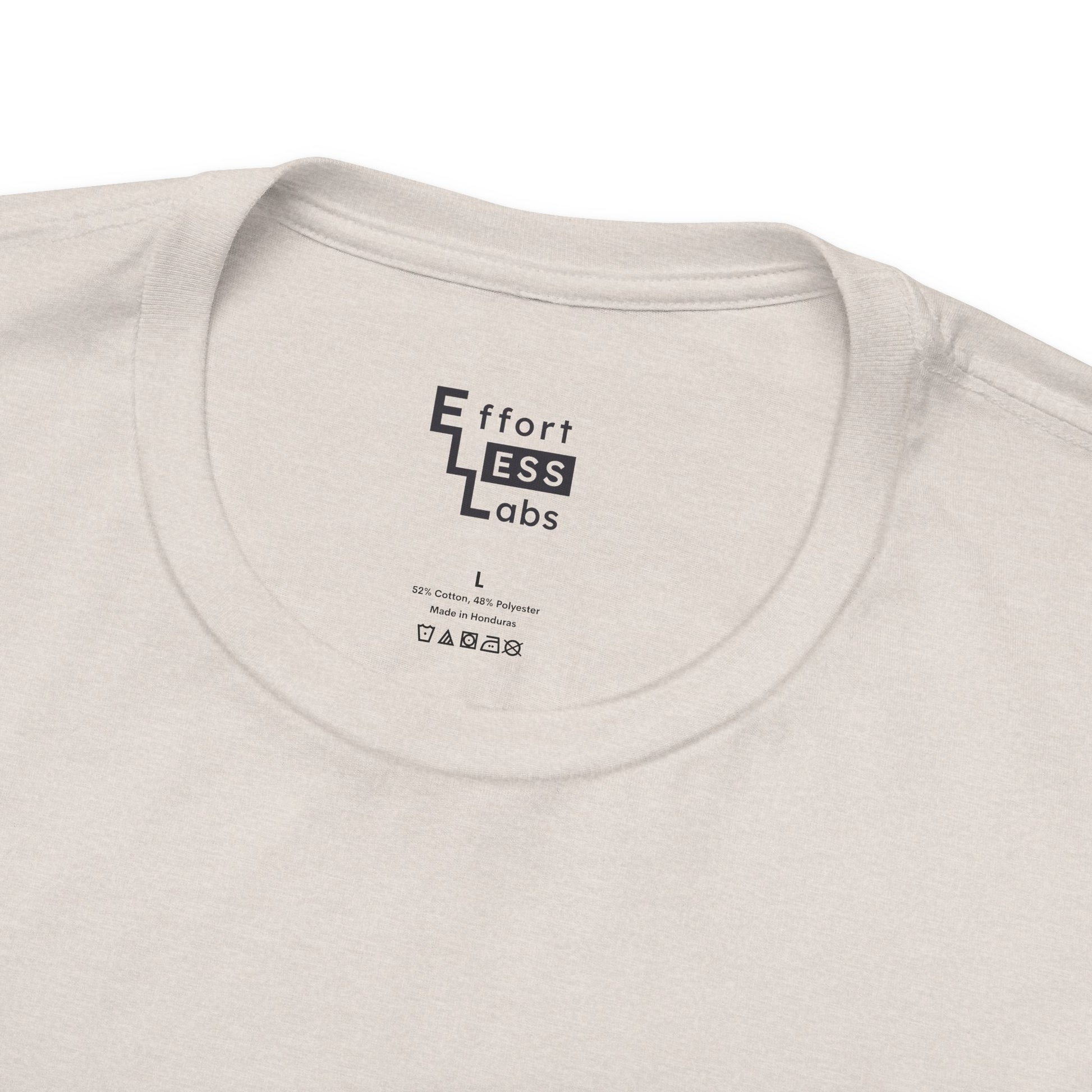 Close-up of a beige t-shirt with 'Effortless Labs' logo on the collar.