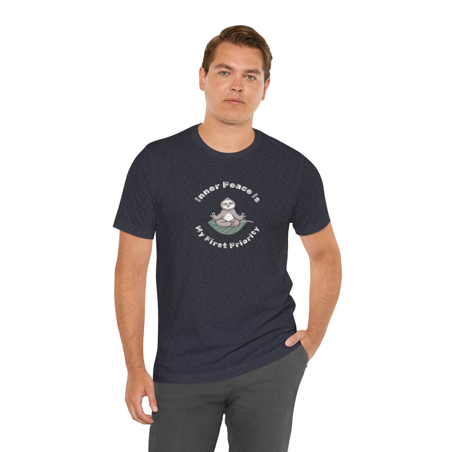 Man wearing a navy t-shirt with a graphic of meditating sloth and text 'Inner peace is my first priority' on a white background
