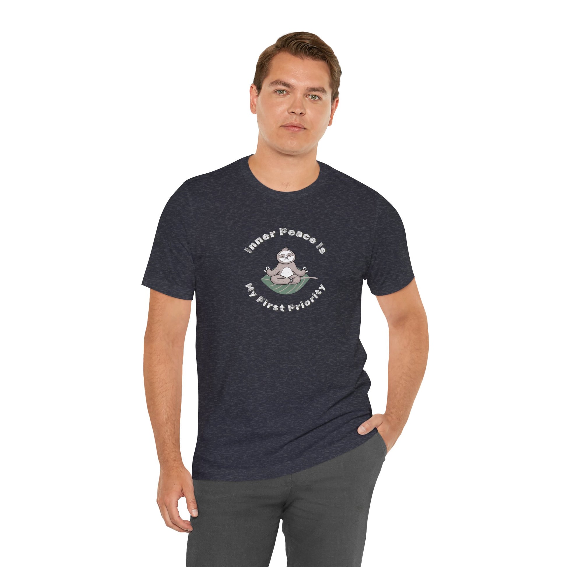Man wearing a navy t-shirt with a graphic of meditating sloth and text 'Inner peace is my first priority' on a white background