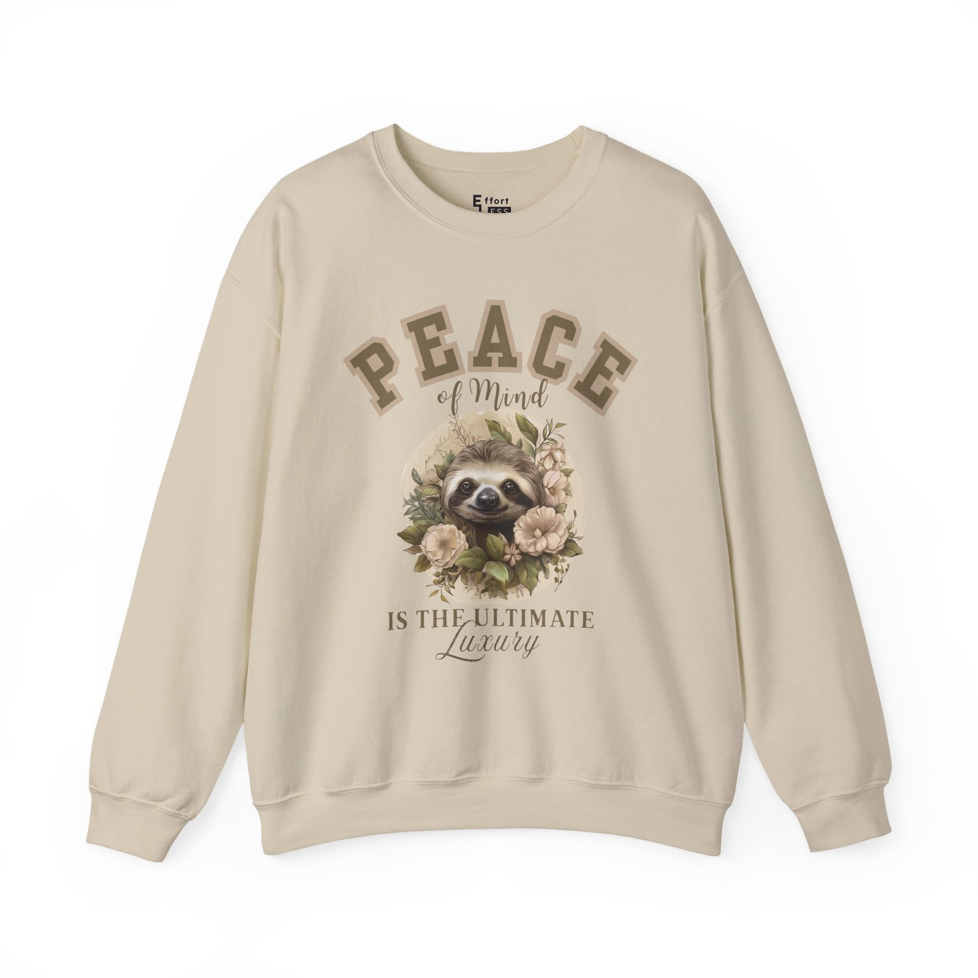 Sand beige sweatshirt with floral sloth graphic and text 'Peace of mind is the ultimate luxury' on a white background